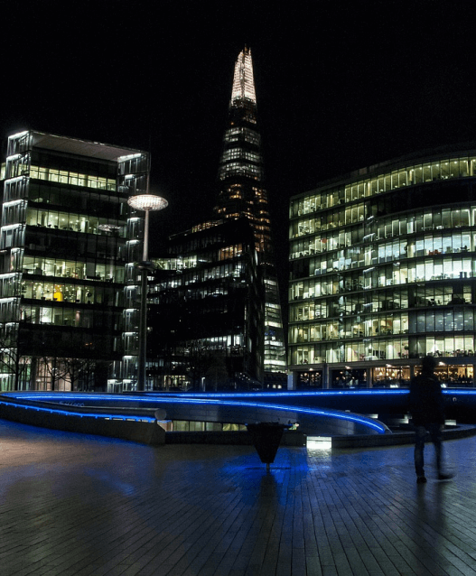 Offices in London with lights on at night